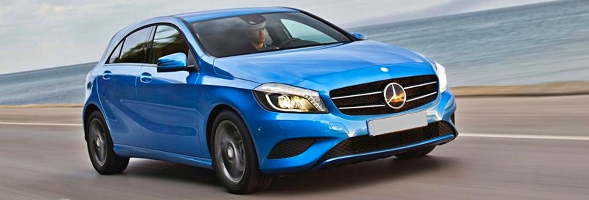 blue Mercedes Benz on a wide road driving for oil service or repair in Perth